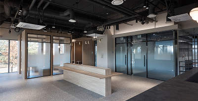 Minimalist office lobby with dark tones
