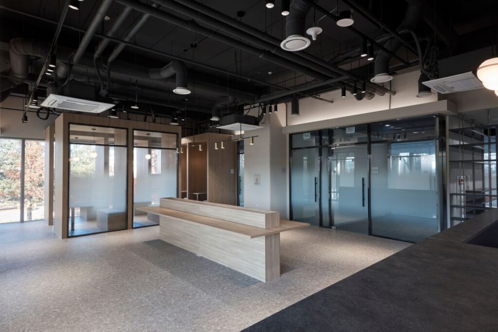 Commercial office space after professional deep clean, including detailed dusting and hot water extraction carpet cleaning.